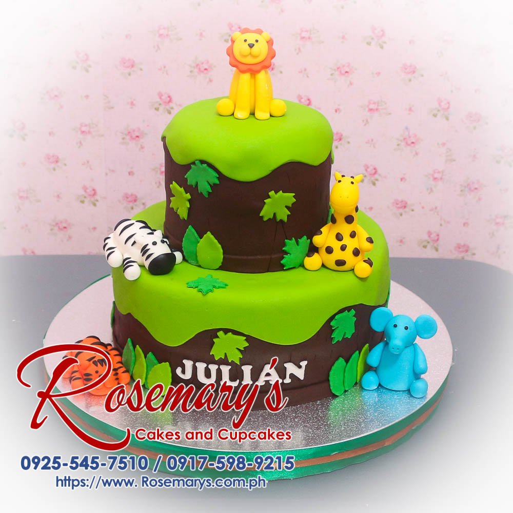 2 Layer Safari Themed Cake for Julian Delicious 2 layer safari themed cake with fondant animals, vibrant green design. Order from Rosemary's Cakes: 0925-545-7510.