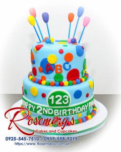 Delicious 2-layer Sesame Street themed cake adorned with colorful balloons, in vibrant blue. From Rosemary's Cakes, 0925-545-7510.