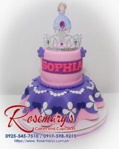 Delicious two-tier pink and purple Sofia the First themed cake. Order your custom cake from Rosemary's Cakes: 0917-598-9215.