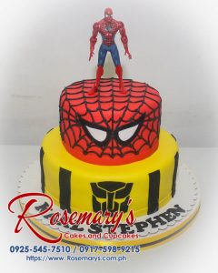Delicious 2-tier yellow cake decorated with Spiderman and Transformers figurines. Red and yellow frosting detail this themed masterpiece. Rosemary's Cakes | 0925-545-7510