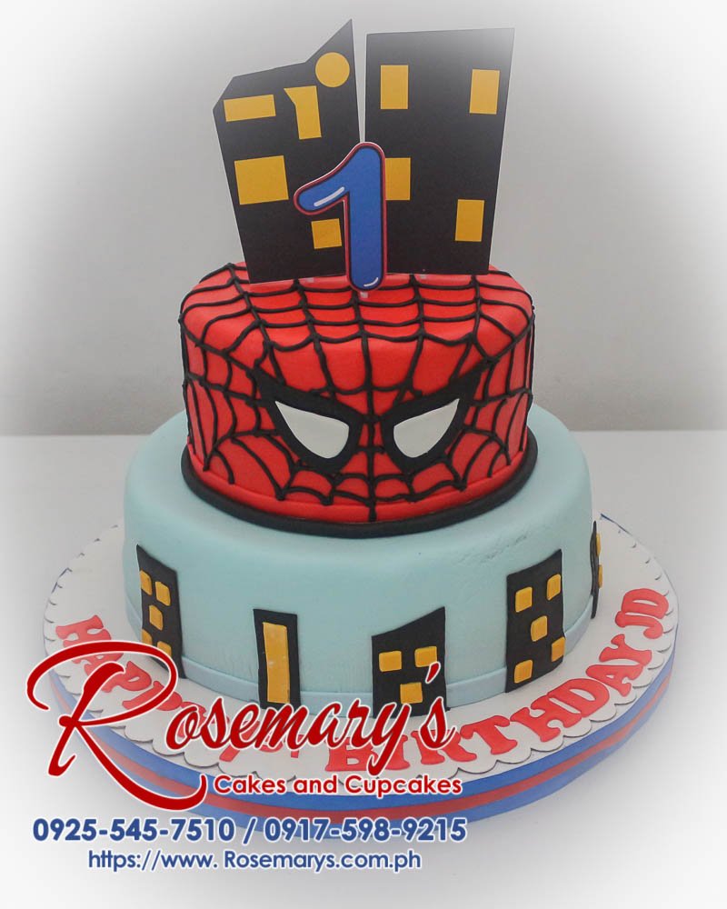 Red and blue two-tier Spiderman cake with intricate web design. Delicious and perfect for superhero fans! Order yours from Rosemary's Cakes: 0917-598-9215.