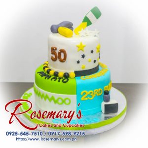 Delicious two-layer split cake with vibrant blue and green icing. Perfect for birthdays! Order yours from Rosemary's Cakes: 0925-545-7510.