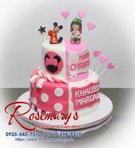 Delectable two-tier Minnie Mouse cake adorned in pink. Perfect for christenings and baptisms. By Rosemary's Cakes: 0925-545-7510.