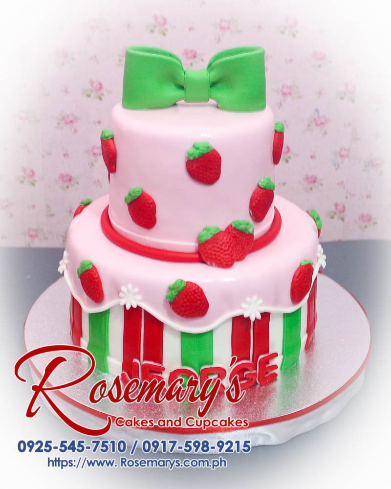 2 Layer Strawberry Themed Cake for Jeorge 2 layer strawberry themed cake with pink frosting, ribbon decor, and fresh strawberries. Order from Rosemary's Cakes: 0917-598-9215.
