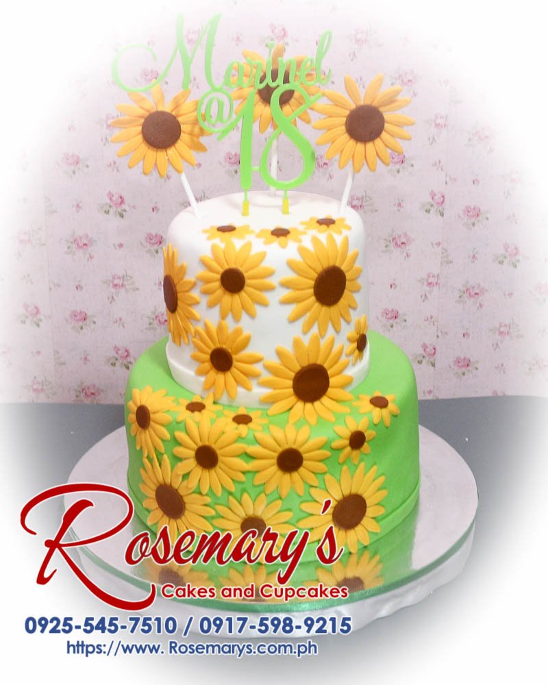 2 Layer Sunflower Themed Cake for Marinel’s 18th Birthday Two-layer sunflower themed cake with vibrant yellow flowers and green accents, crafted by Rosemary's Cakes. Contact: 0925-545-7510.