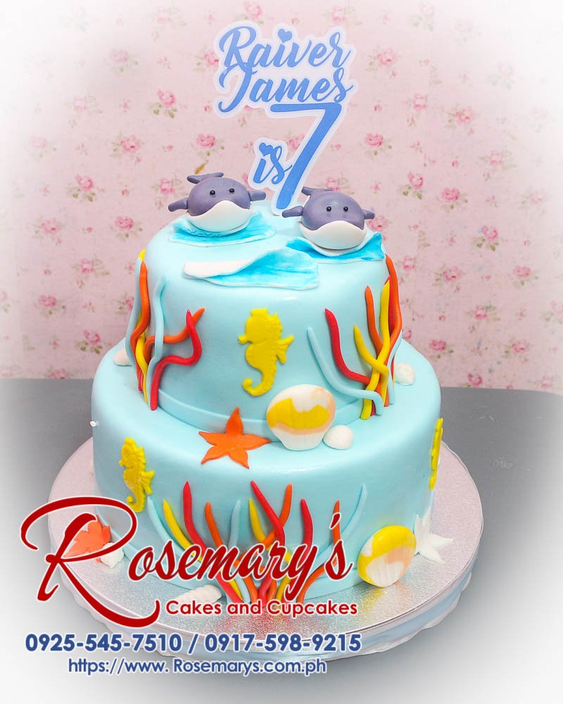 Delicious 2 layer Under The Sea Cake from Rosemary's Cakes, featuring vibrant blue decor and ocean-themed elements. Contact: 0925-545-7510.