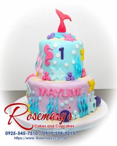 Delicious 2-layer blue under the sea themed cake with mermaid decorations. Order from Rosemary's Cakes at 0917-598-9215.