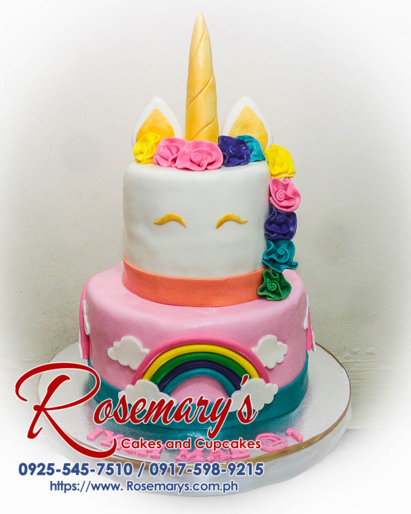Colorful 2-layer unicorn cake adorned with vibrant sprinkles and a shimmering horn. Perfect for celebrations! Rosemary's Cakes, 0925-545-7510.