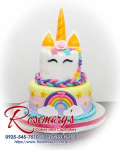 2 layer unicorn themed cake by Rosemary's Cakes, featuring gold and pastel colors, rainbow design, and delicious flavors. Contact: 0917-598-9215.