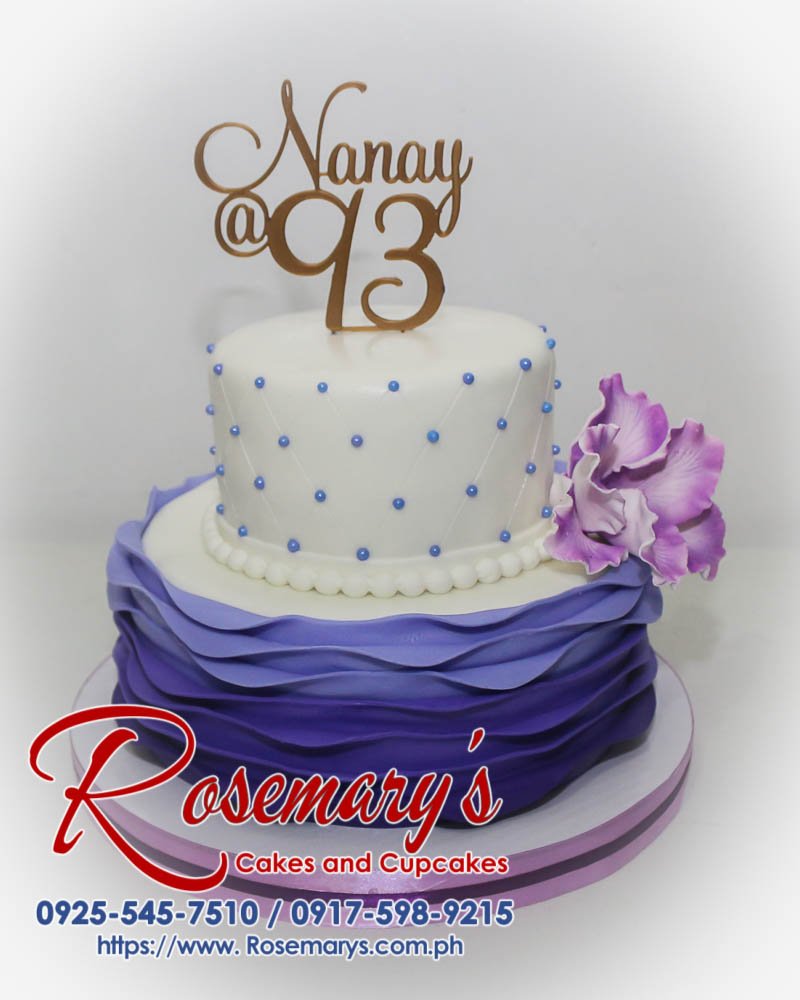 Delicious two-layer purple and white cake with a custom 3D printed topper. Order your own themed cake from Rosemary's Cakes! Call 0917-598-9215.