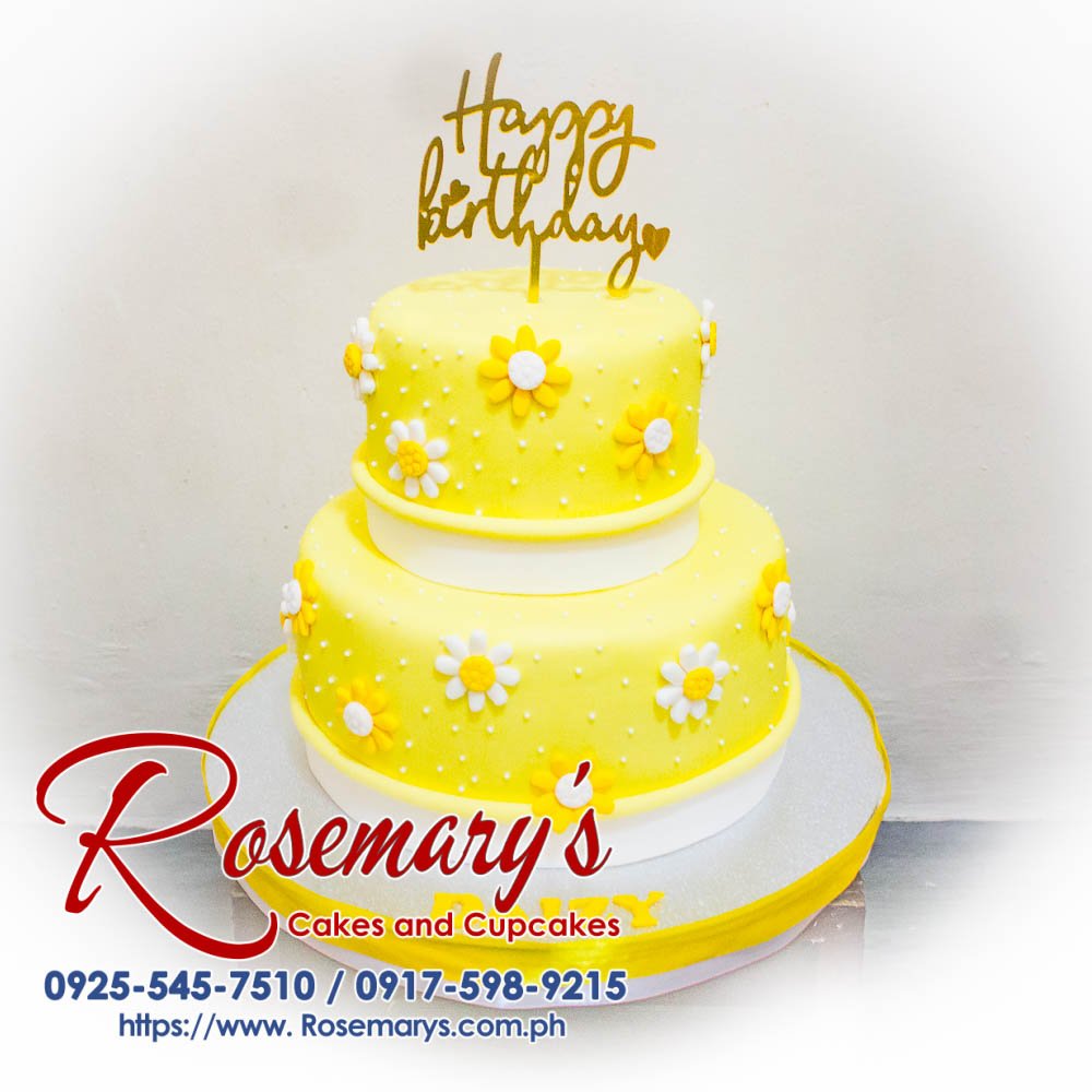 2 Layer Yellow Flowers Themed Cake for Daizy Two-layer yellow cake adorned with delicate buttercream flowers. Perfect for birthdays and celebrations. Order yours from Rosemary's Cakes: 0917-598-9215.