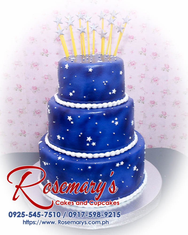 Delicious 3 layer blue airbrushed birthday cake with star accents, perfect for any celebration. Order from Rosemary's Cakes: 0925-545-7510.