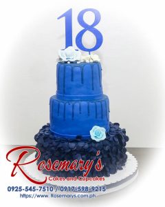 Delicious 3-layer blue drip cake with 3D printed decorations. Perfect for any celebration. From Rosemary's Cakes, contact 0917-598-9215.