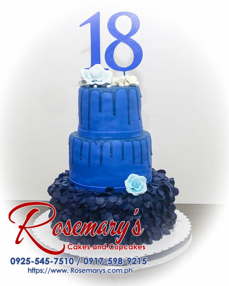 Delicious 3-layer blue drip cake with 3D printed decorations. Perfect for any celebration. From Rosemary's Cakes, contact 0917-598-9215.