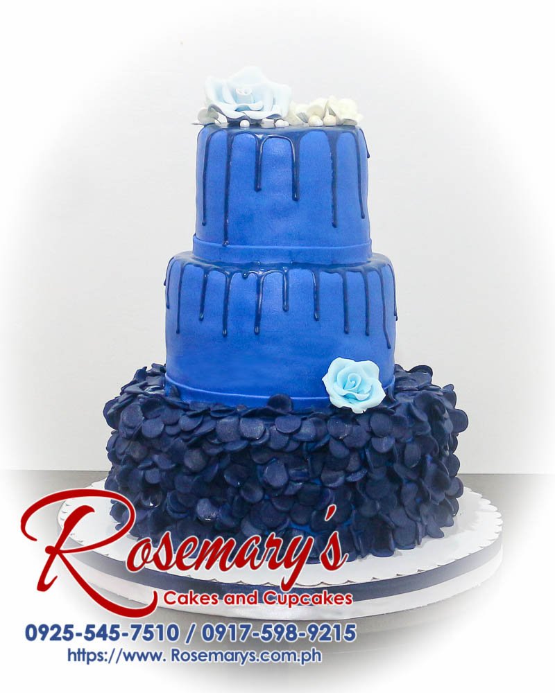 Delicious 3 layer blue drip birthday cake from Rosemary's Cakes, featuring vibrant blue icing and elegant drip design. Contact 0917-598-9215.