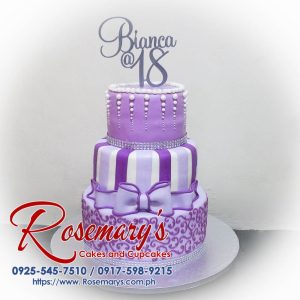 Delicious 3-layer purple themed cake by Rosemary's Cakes, featuring 3D printed designs. Contact: 0917-598-9215.