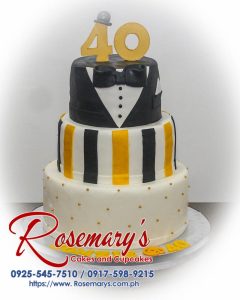 Three-layer black and gold tuxedo-themed cake. Delicious and intricately decorated with 3D printing details. Rosemary's Cakes | 0917-598-9215