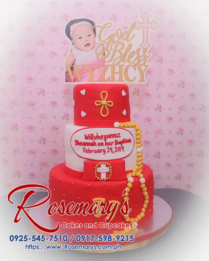 Elegant 3 layer cake in gold and red for a baptismal, featuring white frosting and delicate decorations. Rosemary's Cakes, 0917-598-9215.
