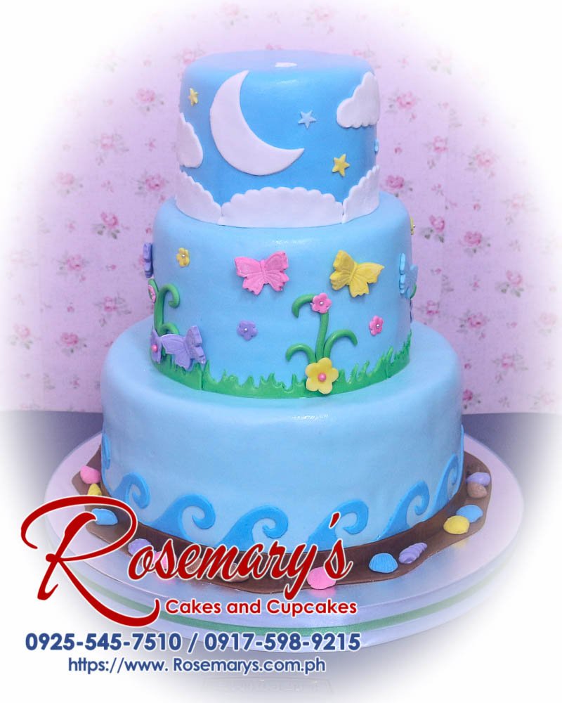 Delicious 3-layer garden-themed cake in blue with floral decorations. Order from Rosemary's Cakes: 0925-545-7510.