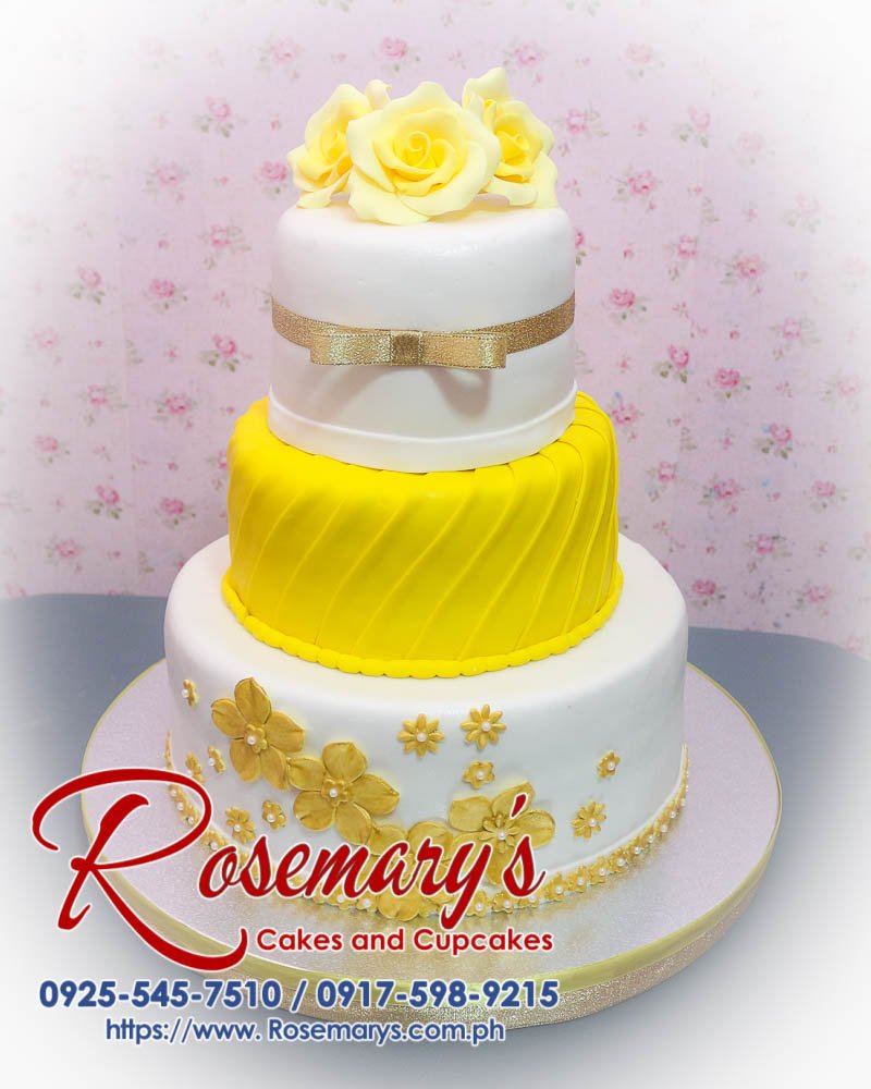 Delicious 3-layer gold, white, and yellow wedding cake from Rosemary's Cakes. Call 0925-545-7510 for orders!