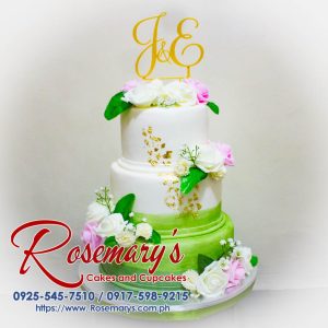 Three-layer green and white wedding cake with intricate 3D printed decorations. Delicious and perfect for weddings. Rosemary's Cakes, 0925-545-7510.
