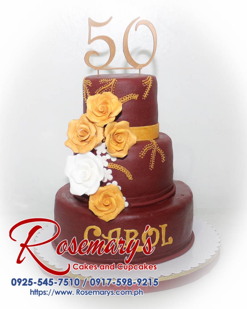 3 Layer Maroon and Gold Cake for Carol Three-layer maroon cake adorned with a shimmering gold 3D printed topper. Delicious and perfect for celebrations! By Rosemary's Cakes - Call 0925-545-7510.