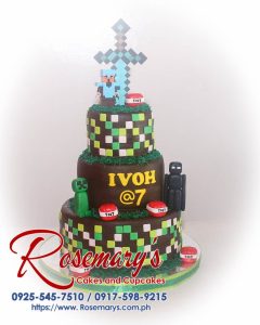 Delicious 3 layer Minecraft-themed cake with brown and green details, perfect for any celebration. Rosemary's Cakes, 0925-545-7510.