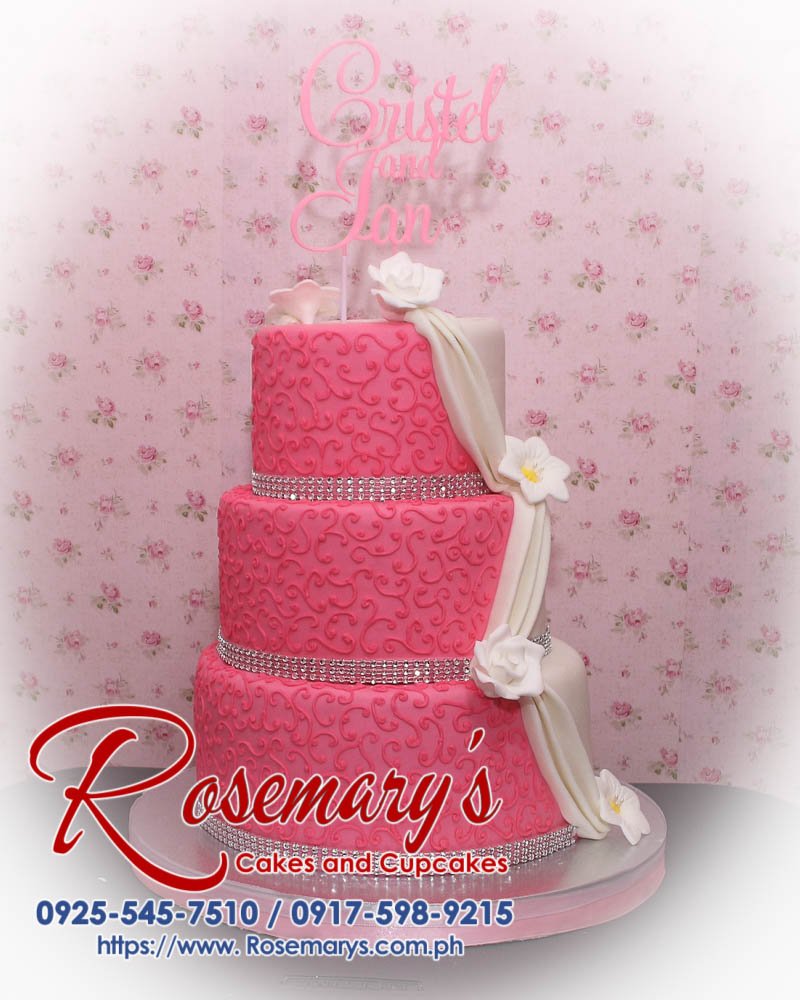 Three-layer pink and white wedding cake with 3D printed topper, crafted by Rosemary's Cakes. Contact: 0917-598-9215.