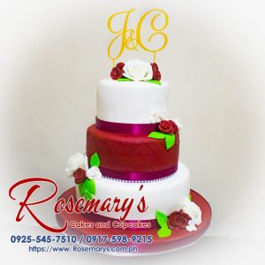 Elegant 3-layer red and white wedding cake with a custom 3D printed topper. Crafted by Rosemary's Cakes, 0917-598-9215.