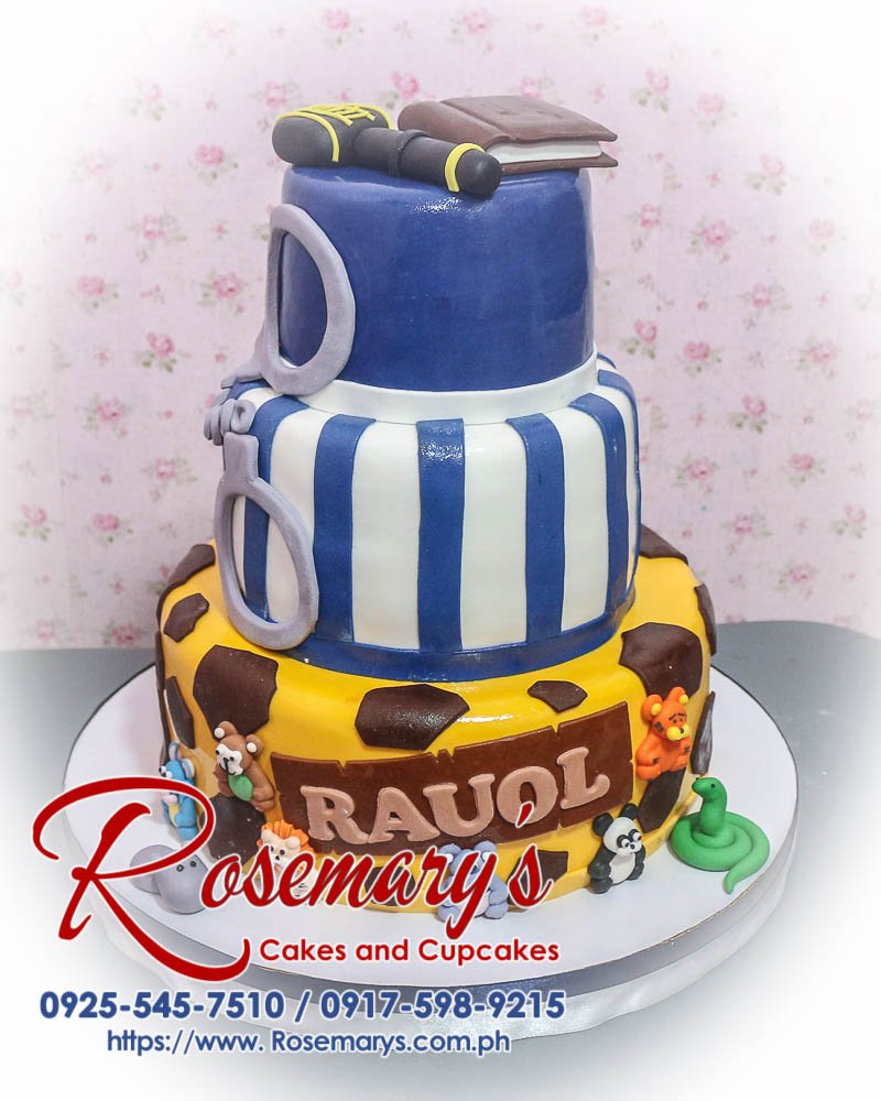 Delicious 3-layer safari-police themed cake featuring vibrant animals, perfect for any celebration. Order from Rosemary's Cakes, 0917-598-9215.