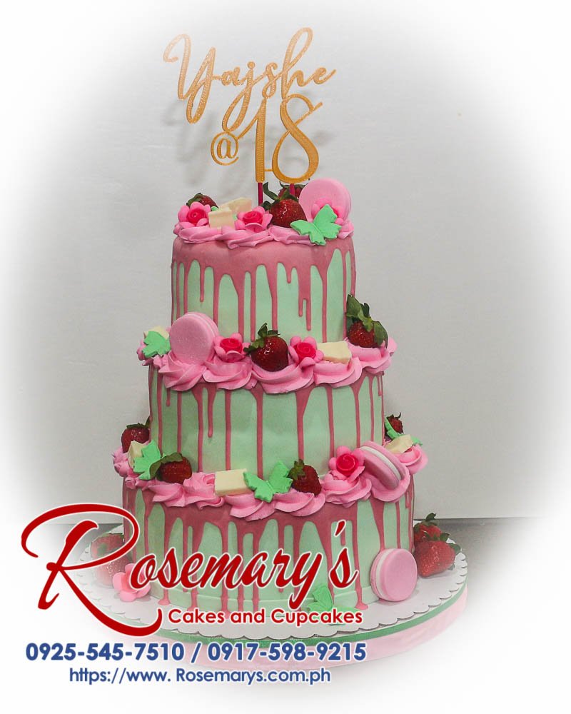 Delicious 3-layer strawberry cake adorned with delicate pink macarons. Perfect for birthdays and celebrations! Order yours from Rosemary's Cakes, 0917-598-9215.