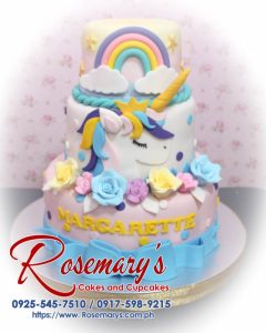 Delicious 3 layer pastel unicorn cake with rainbow details and ribbon, crafted by Rosemary's Cakes. Contact: 0917-598-9215.