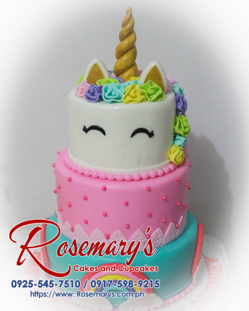 Delicious 3-layer blue and pink unicorn cake with rainbow accents. Order yours from Rosemary's Cakes: 0917-598-9215
