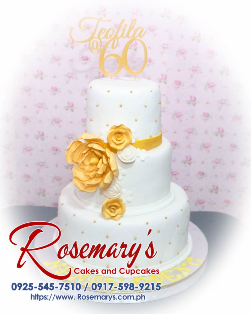 Luxurious 3 layer white and gold themed cake by Rosemary's Cakes, beautifully crafted and delicious. Contact: 0925-545-7510.