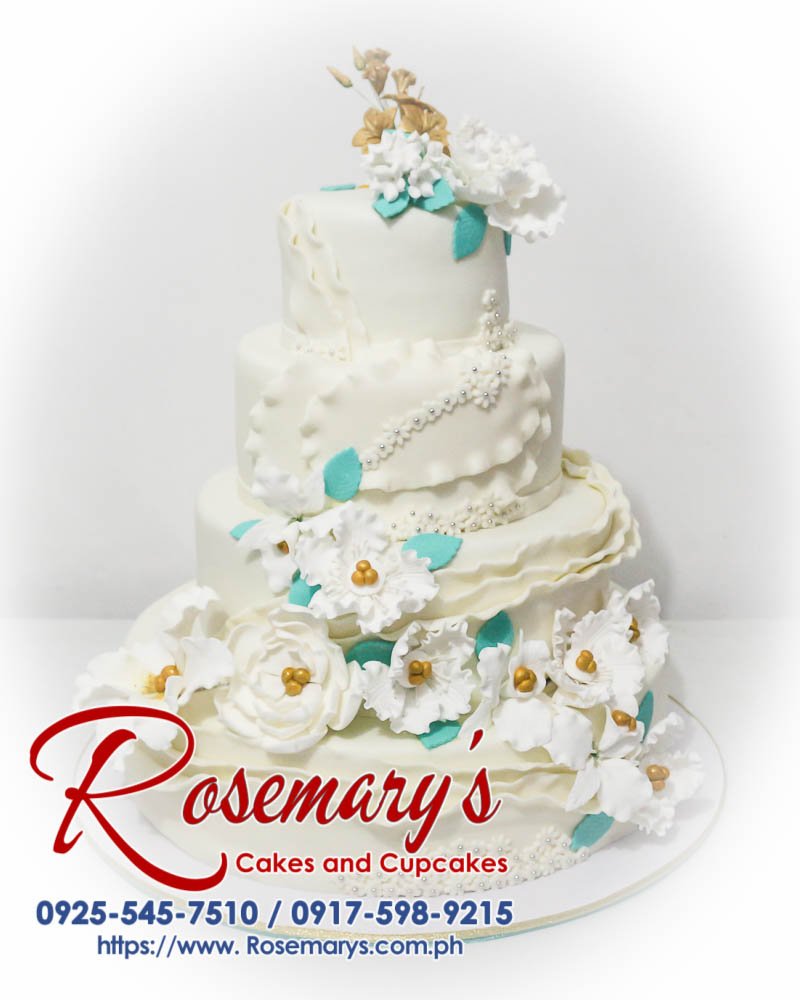 Elegant 4-layer white wedding cake adorned with gold accents. Perfect for a dreamy celebration. Order yours from Rosemary's Cakes: 0925-545-7510