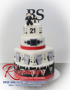 Delicious four-layer black and white cake with intricate fondant details and custom 3D printed Mafia-themed toppers. Order yours from Rosemary's Cakes: 0917-598-9215.