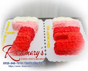 Pink and red iced number cake with delicate floral accents. Order your custom creation from Rosemary's Cakes! 0925-545-7510