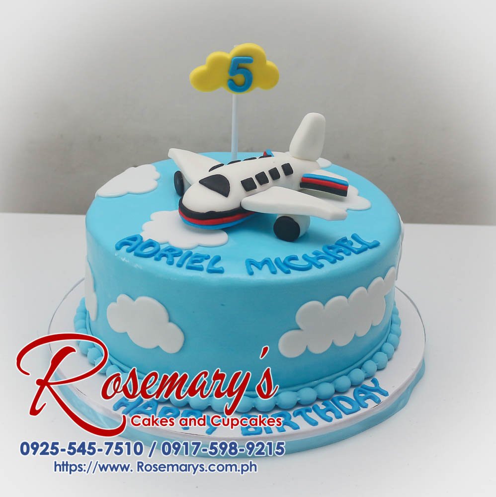 Delicious single-layer blue cake with an airplane design and fluffy white cloud accents. Rosemary's Cakes | 0925-545-7510