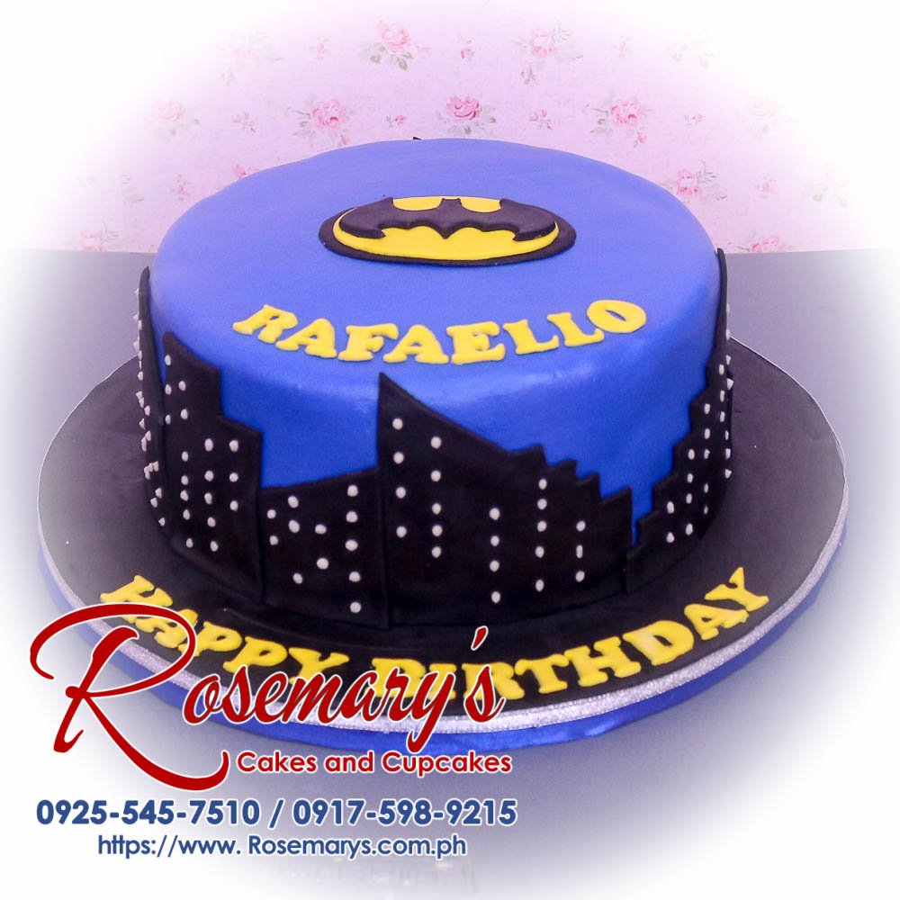Delicious 1-layer Batman themed cake in black and blue with striking yellow accents, crafted by Rosemary's Cakes. Call 0917-598-9215.