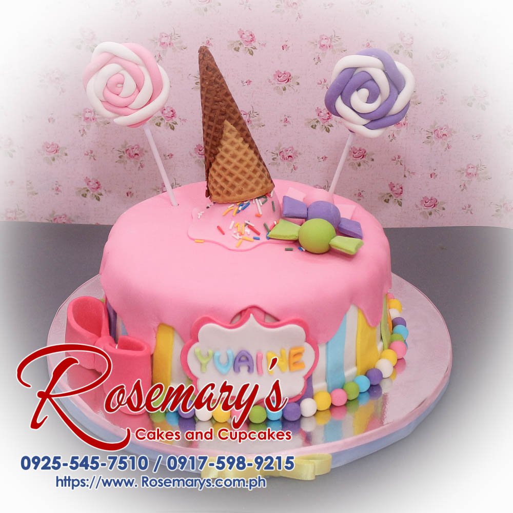 Candy Land Themed Cake for Yvaine Candy Land themed 1 layer cake adorned with pink frosting, colorful candy decorations, and a ribbon. Rosemary's Cakes 0925-545-7510.