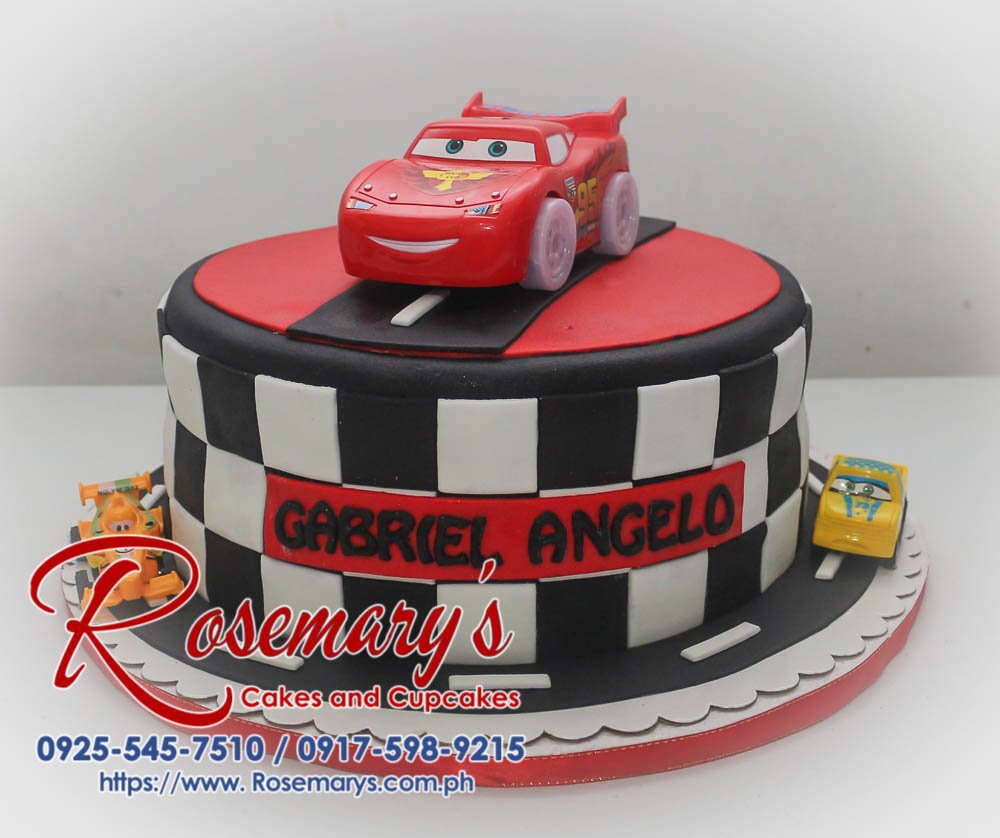 Delicious single-layer black and red birthday cake decorated with Lightning McQueen and car details. Order yours from Rosemary's Cakes: 0917-598-9215