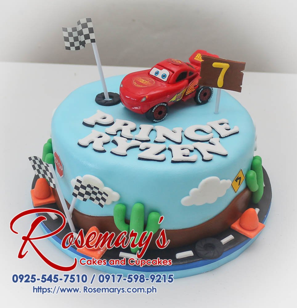 Cars Themed Cake for Prince Ryzen Blue one-layer birthday cake featuring a Lightning McQueen design. Perfect for car enthusiasts! Rosemary's Cakes: 0917-598-9215