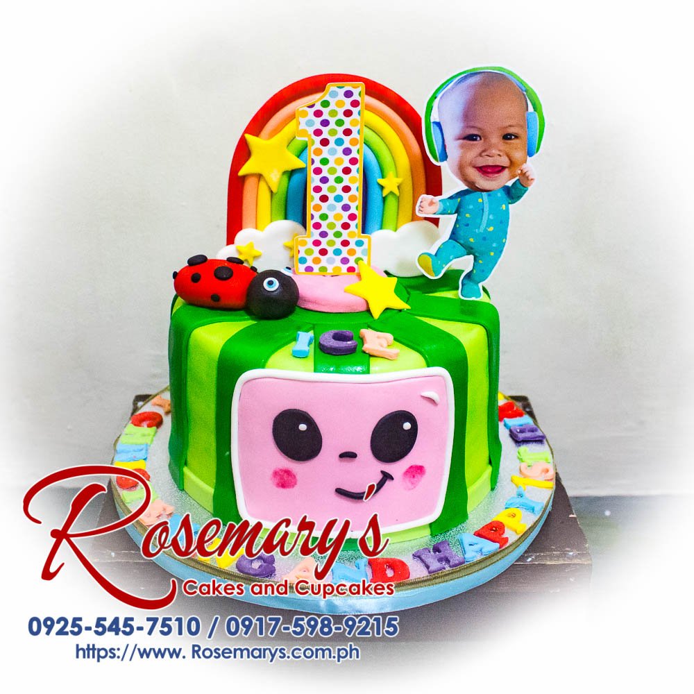 One-layer Cocomelon themed cake decorated with vibrant fruits and fondant characters. Order your own delicious custom cake from Rosemary's Cakes! Call 0925-545-7510.