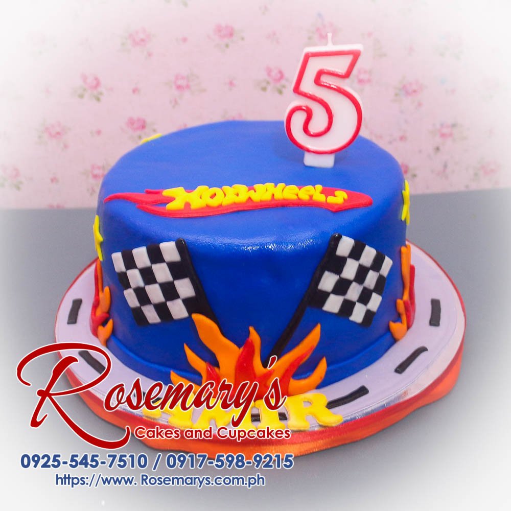 Delicious blue Hot Wheels themed cake by Rosemary's Cakes. Perfect for birthdays! Contact: 0917-598-9215.
