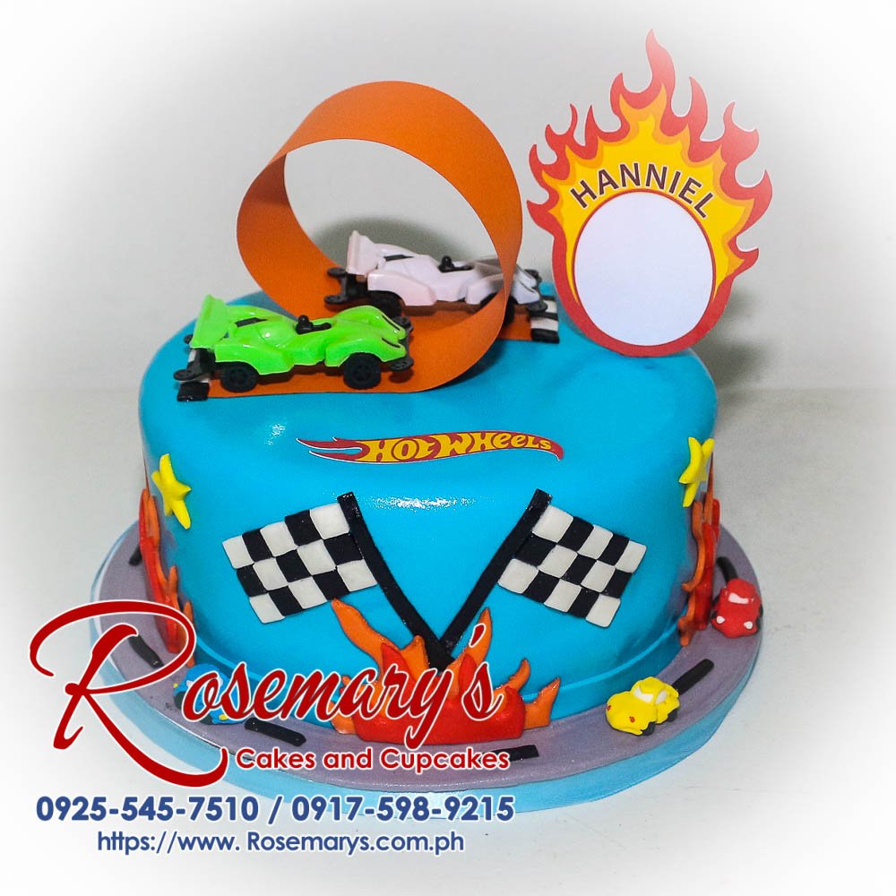 One-layer blue birthday cake decorated with a Hot Wheels theme. Delicious and perfect for any car enthusiast! Rosemary's Cakes | 0917-598-9215