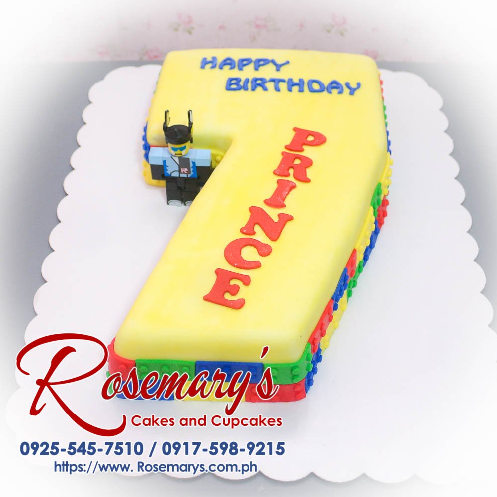 Lego Themed Number Cake for Prince Lego themed number cake by Rosemary's Cakes, featuring vibrant yellow and intricate Lego designs. Contact: 0925-545-7510.