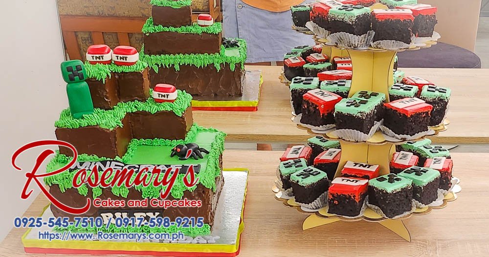 Delicious Minecraft-themed icing cake with square cupcakes, perfect for celebrations. Contact Rosemary's Cakes: 0925-545-7510.