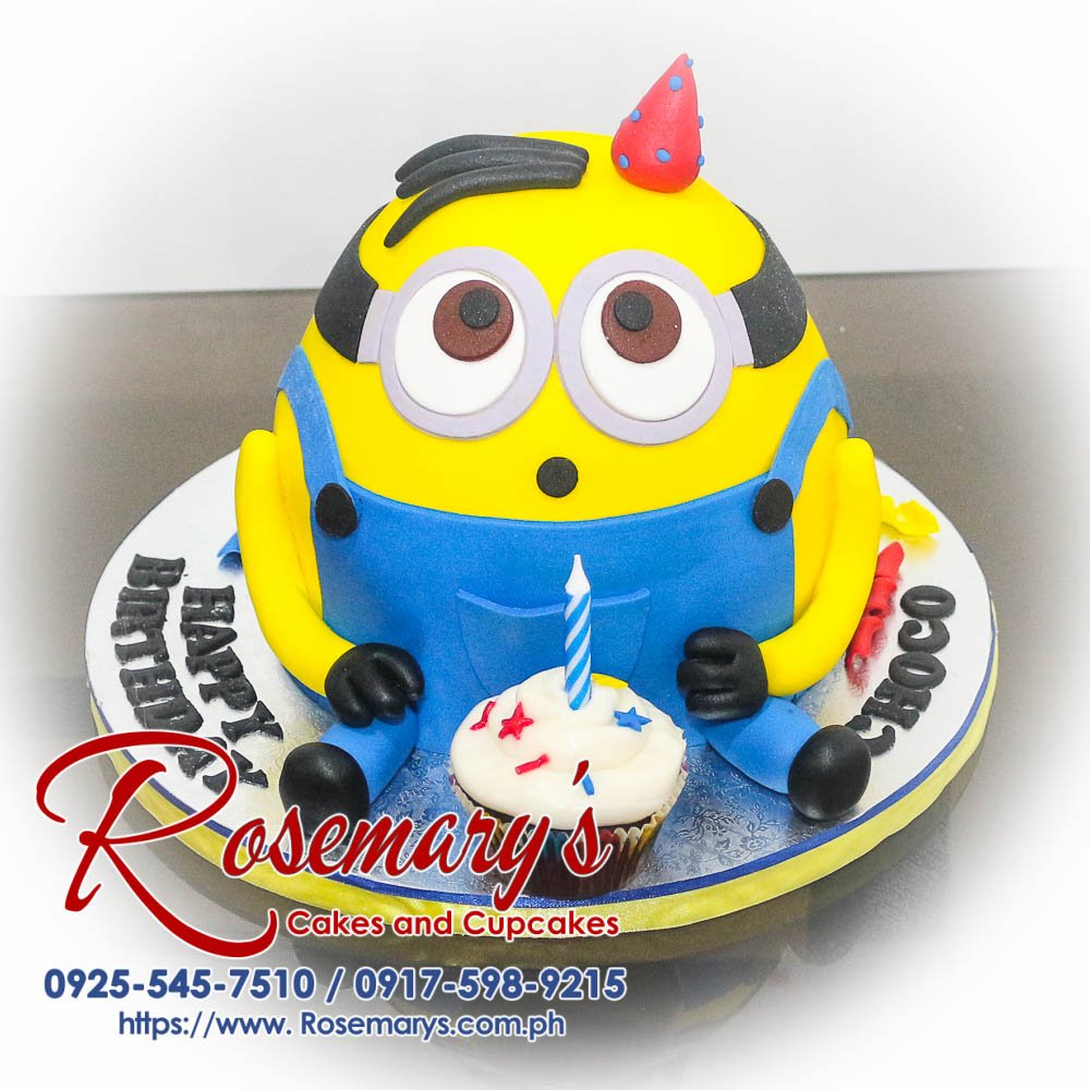 Delicious Minions-themed cake from Rosemary's Cakes, featuring a vibrant blue and yellow design. Contact: 0917-598-9215.
