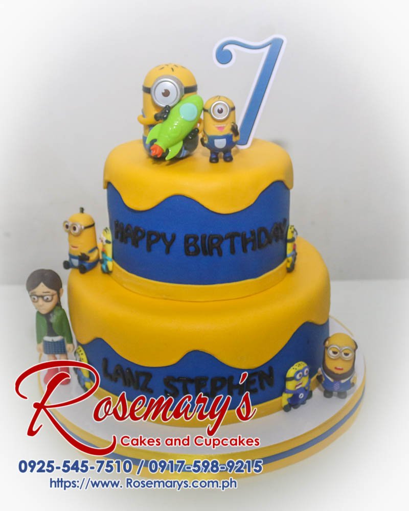 Two-tier Minion themed cake with yellow frosting and fondant Minion characters. Order your own custom cake from Rosemary's Cakes! Call 0917-598-9215.