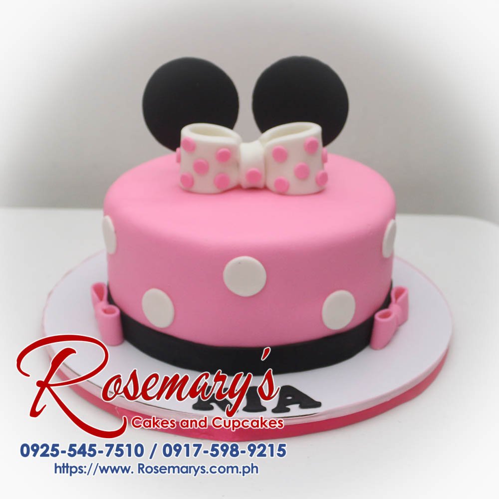 Delicious one-layer Minnie Mouse cake with pink frosting and iconic ears. Order your custom cake from Rosemary's Cakes! Call 0925-545-7510.